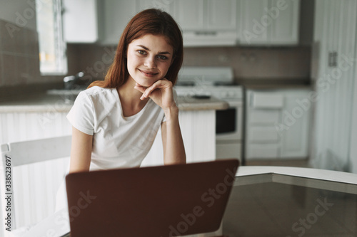 young woman working on laptop