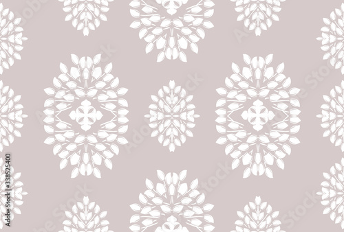White monohrome floral ornate pattern. Seamless design for fabric, textile, book, interior, wallpaper. © WI-tuss