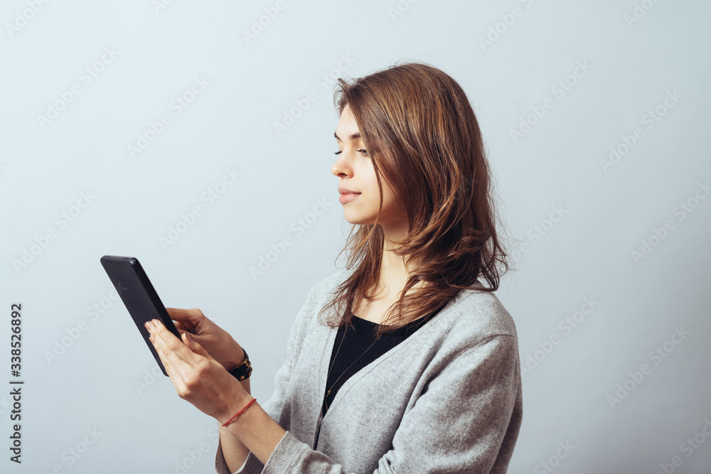 young woman using digital tablet computer young woman using digital tablet computer