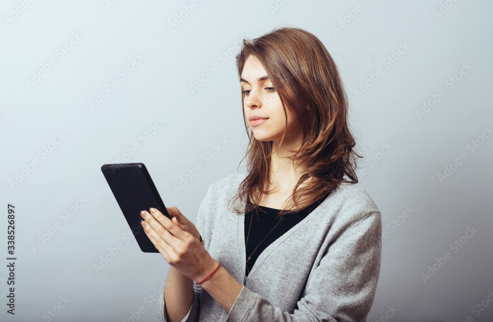 young woman using digital tablet computer young woman using digital tablet computer