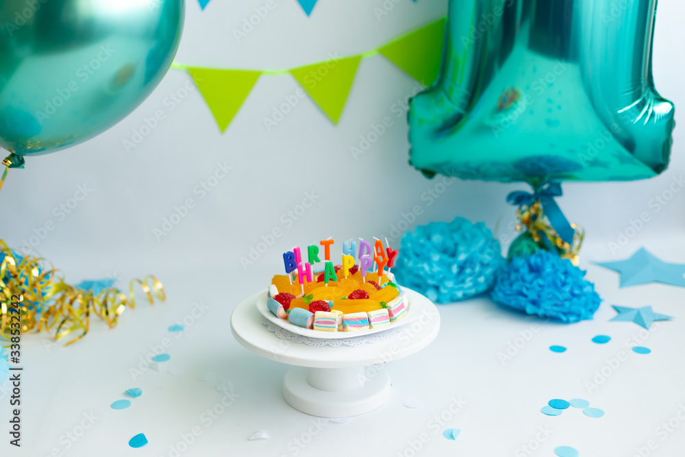 Fototapeta premium children's holiday. first birthday. a year. balloons. large unit