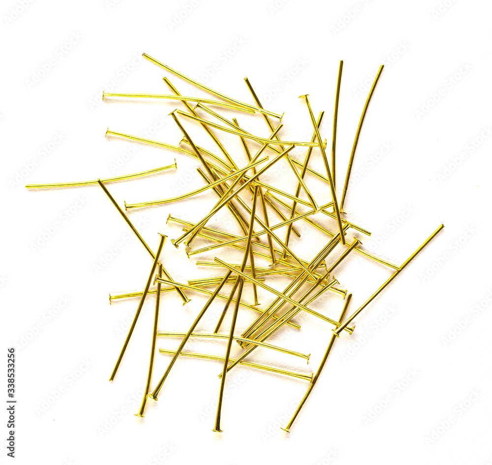 beautiful gold hairpins, stars, various hair decorations isolated on a white background. accessories for handmade jewelry