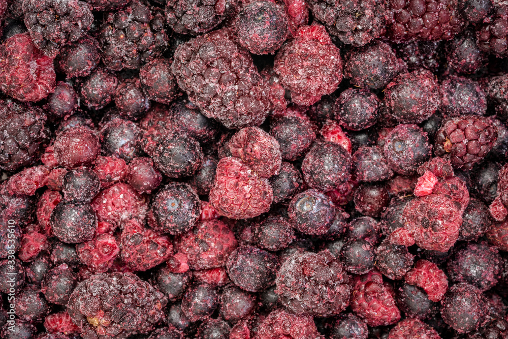 frozen mixed berries closeup background frozen mixed berries closeup background