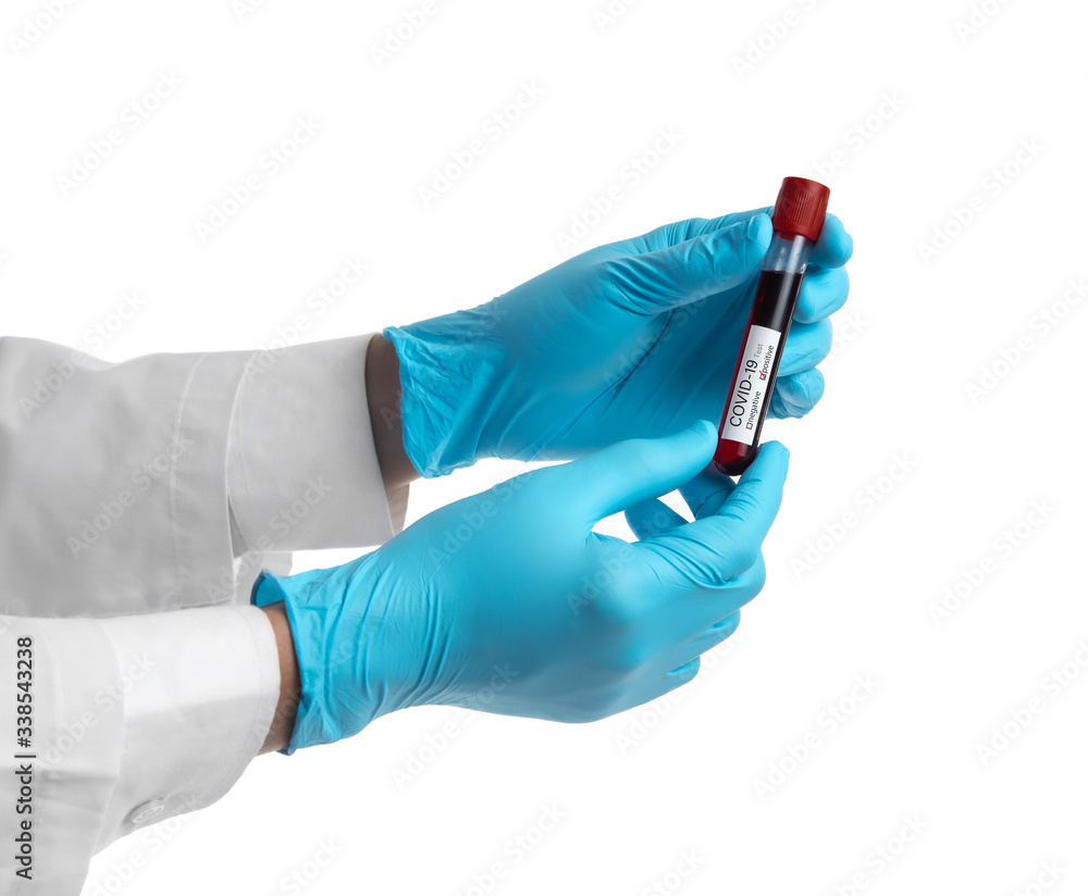 Female hand holding test tube with blood for Covid-19 (coronavirus) analyzing. Laboratory testing patient’s blood isolated on white Female hand holding test tube with blood for Covid-19 (coronavirus) analyzing. Laboratory testing patient’s blood isolated on white