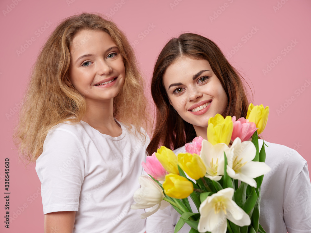 Fototapeta mother and daughter with tulips