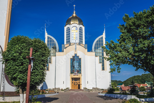 Front view of Supreme Apostles Peter and Paul Cathedral in Chortkiv city, Ukraine photo