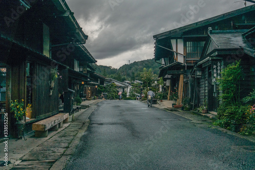 Black houses in a cozy village in Japan on an overcast day