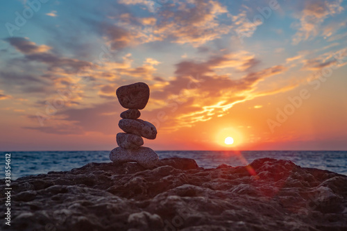 Zen concept. Sunset. The object of the stones on the beach at sunset.  Relax & Meditation. Zen stones