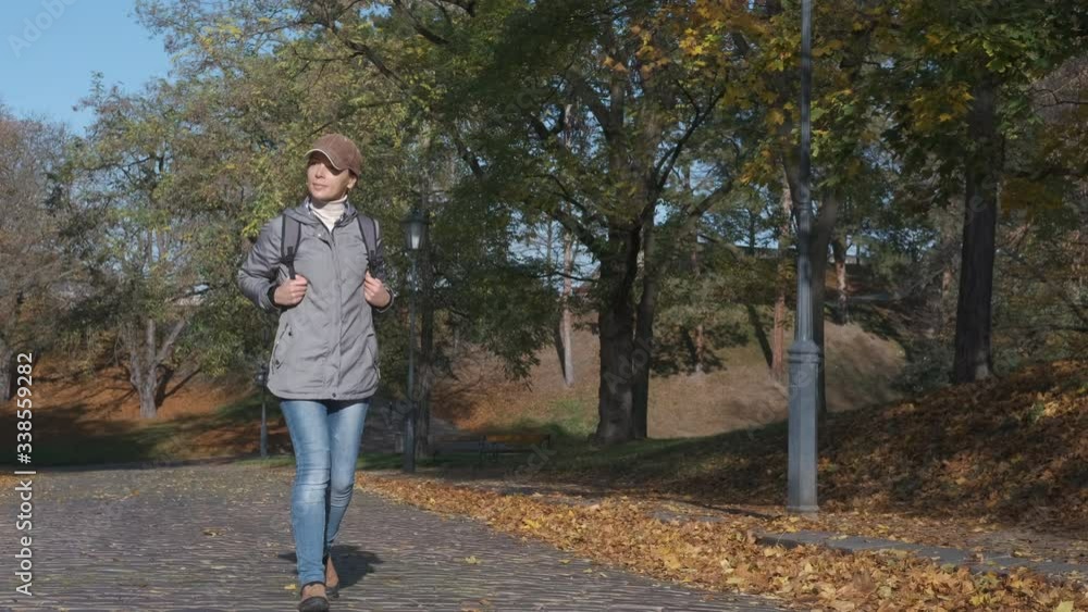 Walk along the autumn cobblestone street. Walk along the autumn cobblestone street.