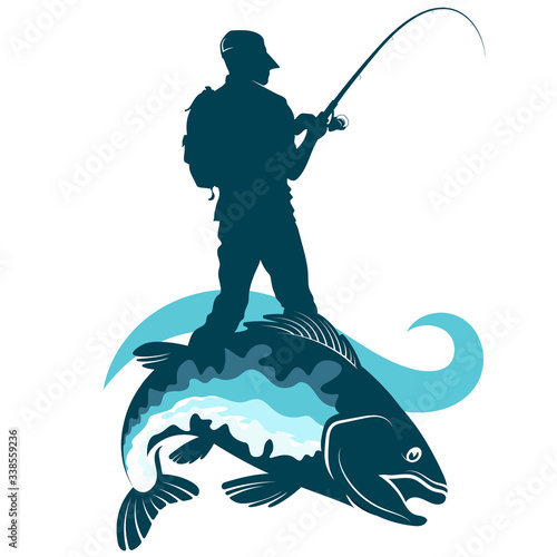 Ffisherman with a fishing rod in his hands and fish caught