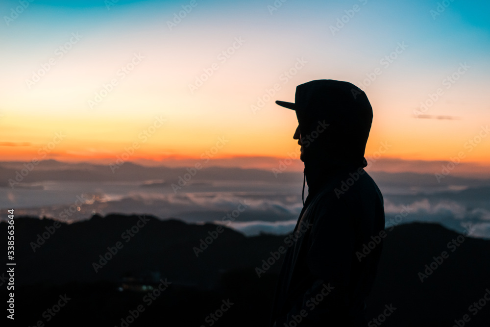 Silhouette of man in a beautiful sunset