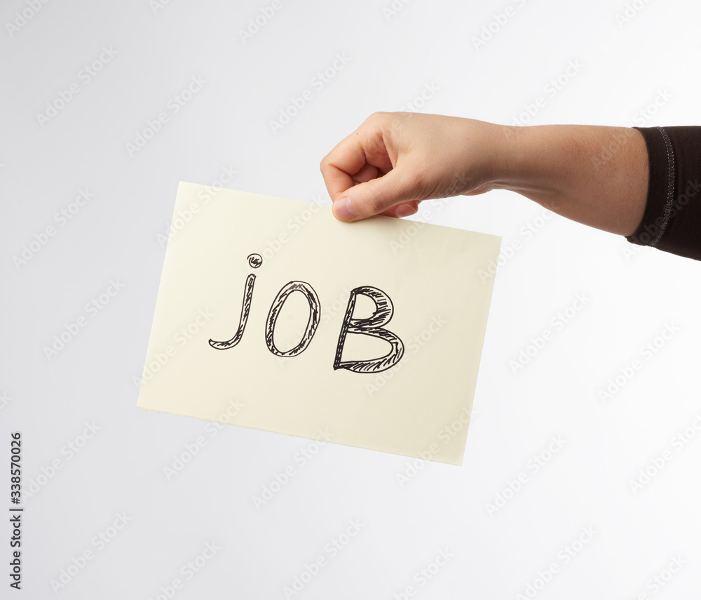 piece of paper with the inscription job, concept of unemployment piece of paper with the inscription job, concept of unemployment