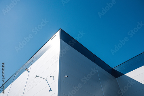  Basic Minimal Shape Abstract Exterior Warehouse or Construction Element Concept, Blue Sky and Cloud in Background with Copy Space