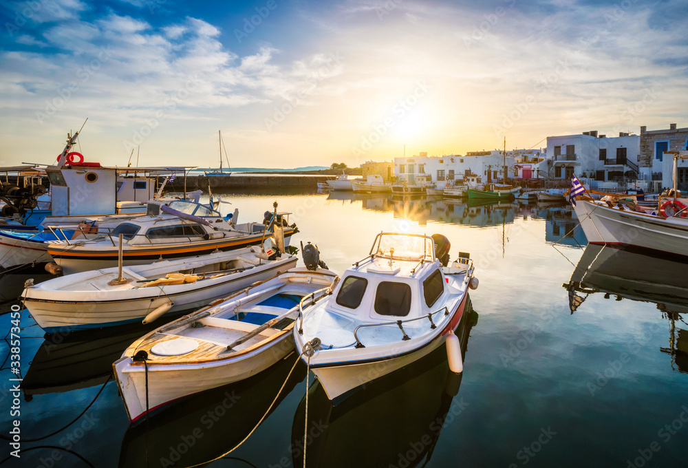 Fishing boats in port of Naousa on sunrise. Paros lsland, Greece