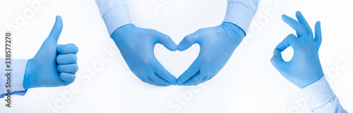 Doctor's hands in medical gloves in shape of heart on blue background with copy space, banner