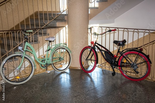 The bike stands in the apartment. Made weekend walks for two