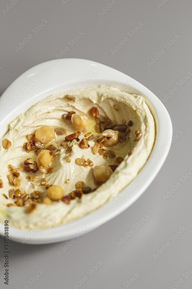 Organic plant based hummus with granola and chick peas toppings. Perfect for vegan gluten free. Freshly homemade for takeaway and delivery. Organic plant based hummus with granola and chick peas toppings. Perfect for vegan gluten free. Freshly homemade for takeaway and delivery.