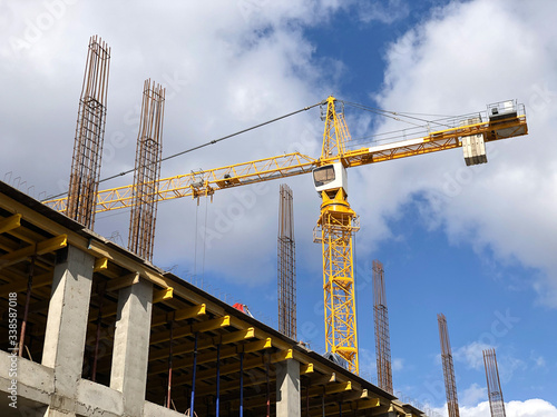 Column crane at construction site
