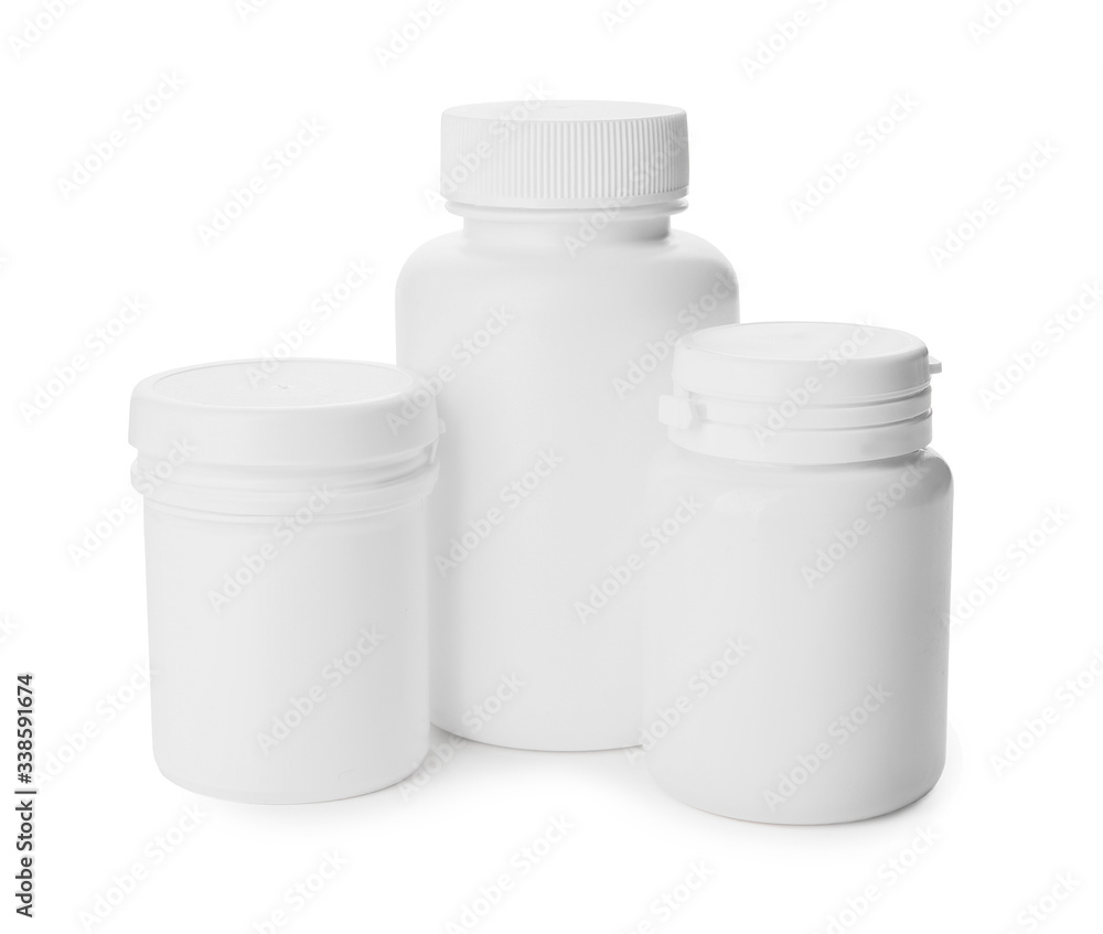 Bottles of different pills on white background Bottles of different pills on white background