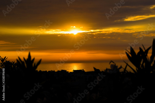 puesta del sol ,huanchaco trujillo -Perú photo