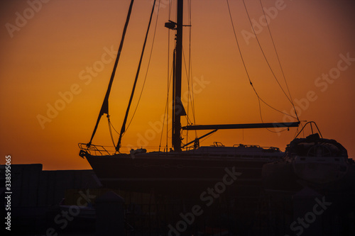 Fototapeta Naklejka Na Ścianę i Meble -  boat beach sunset