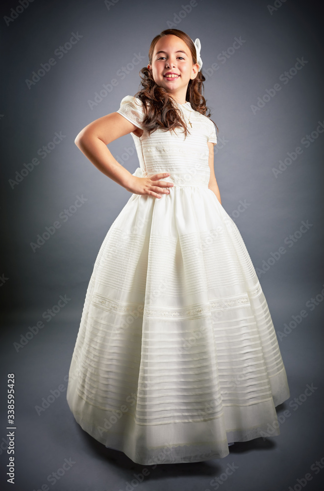 Gorgeous young girl dressed in white