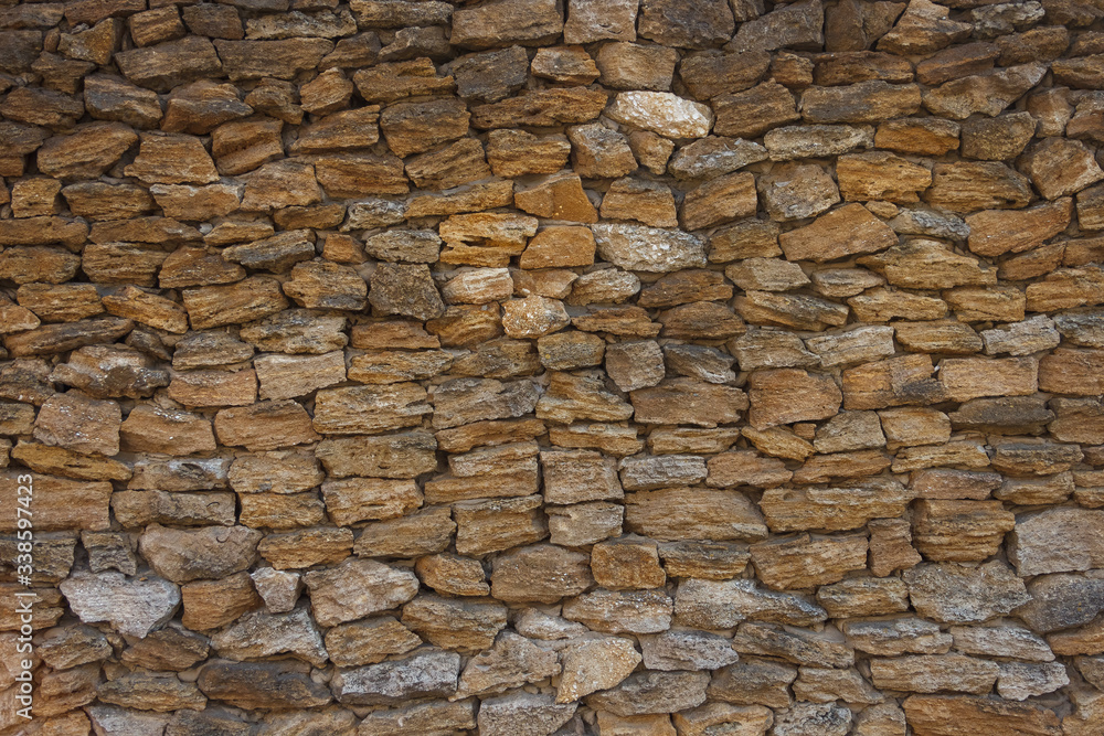 Obraz premium Wall of natural stone. Background for 3d