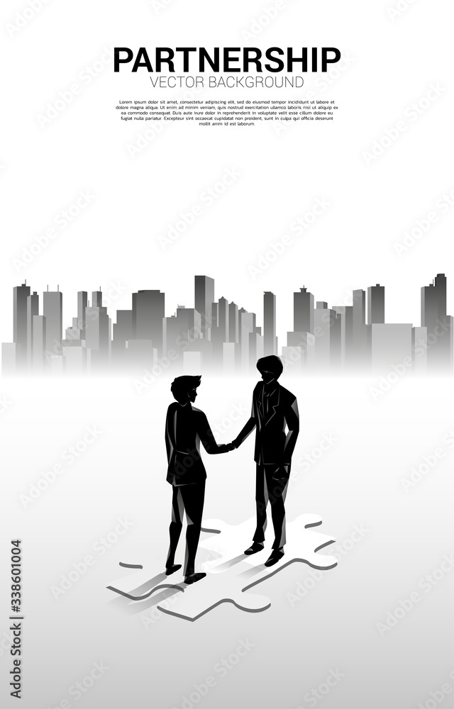 Silhouette of businessman handshake on jigsaw with city background. Concept of team work partnership and cooperation. Silhouette of businessman handshake on jigsaw with city background. Concept of team work partnership and cooperation.
