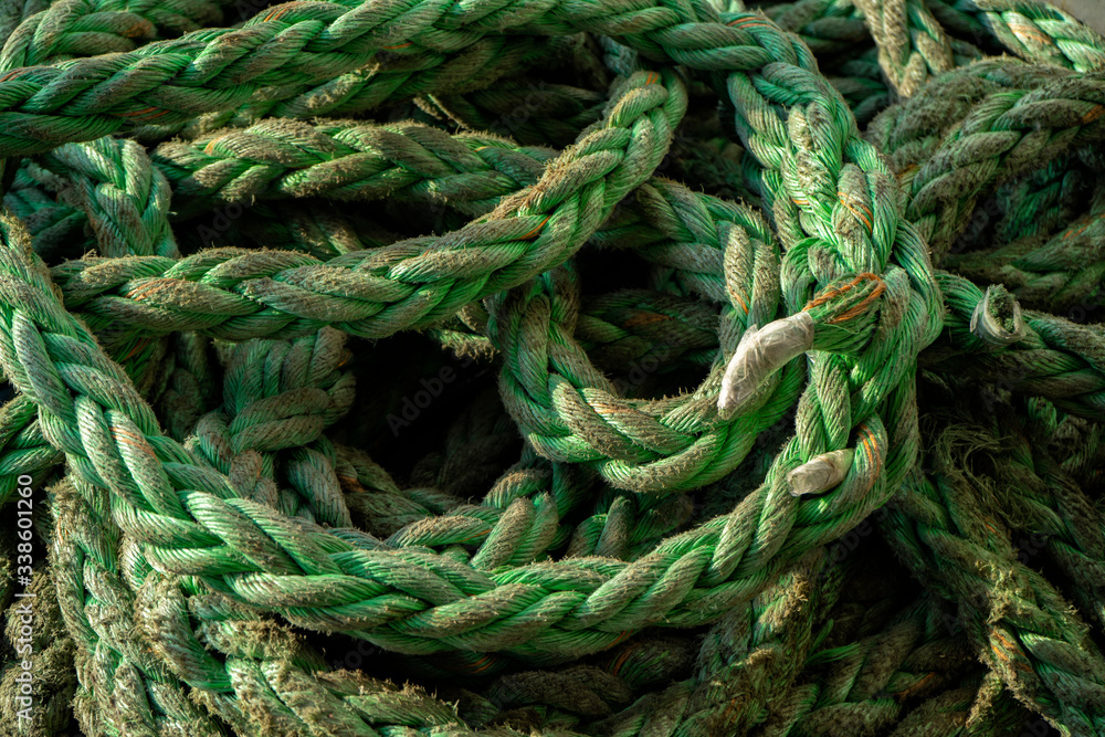 Worn out green nautical rope