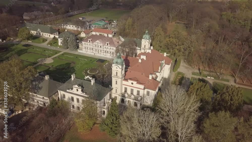 Aerial autumn view to Zamoyski Palace in Kozlowka. Rococo and neoclassical palace complex located in Kozlowka near Lublin, eastern Poland Aerial autumn view to Zamoyski Palace in Kozlowka. Rococo and neoclassical palace complex located in Kozlowka near Lublin, eastern Poland