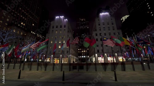 Night in New York During Corona Virus Outbreak. Rockefeller Center Plaza and States Flags Without People