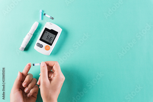 Fotografie Healthcare and medical concept, The diabetic measures the level of glucose in the blood