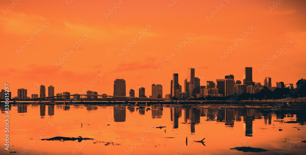 silhouette sunset skyline silhouette cityscape buildings reflection sunrise architecture downtown tower miami florida orange skyscraper panorama impressions