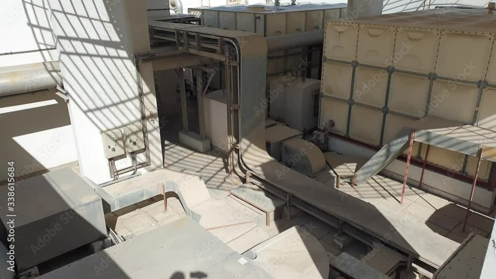 View of a huge group of air conditioning on a roof.