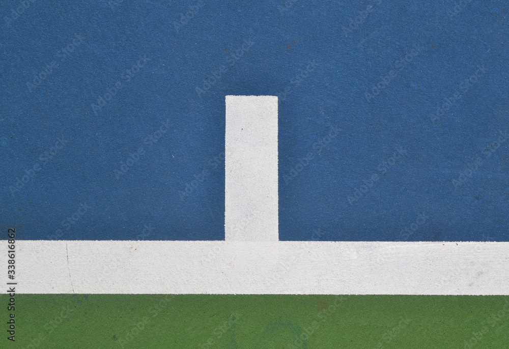 Fototapeta premium Tennis court at base line mark, close up, aerial view.