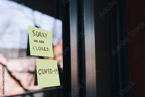 Wallpaper Mural Sign or note on the entrance to a shop, cafe or other small business saying "sorry, we are closed" during the quarantine due to coronavirus covid 19 or covid-19  global viral pandemic Torontodigital.ca
