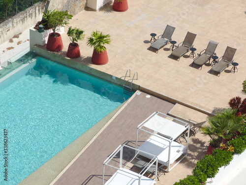 Pool for summer vacations, pool concept © Narayan