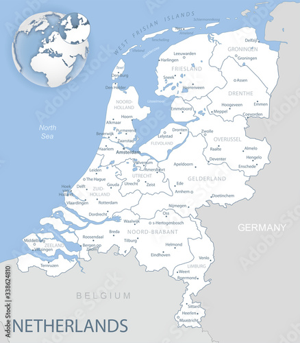 Blue-gray detailed map of Netherlands and administrative divisions and location on the globe.