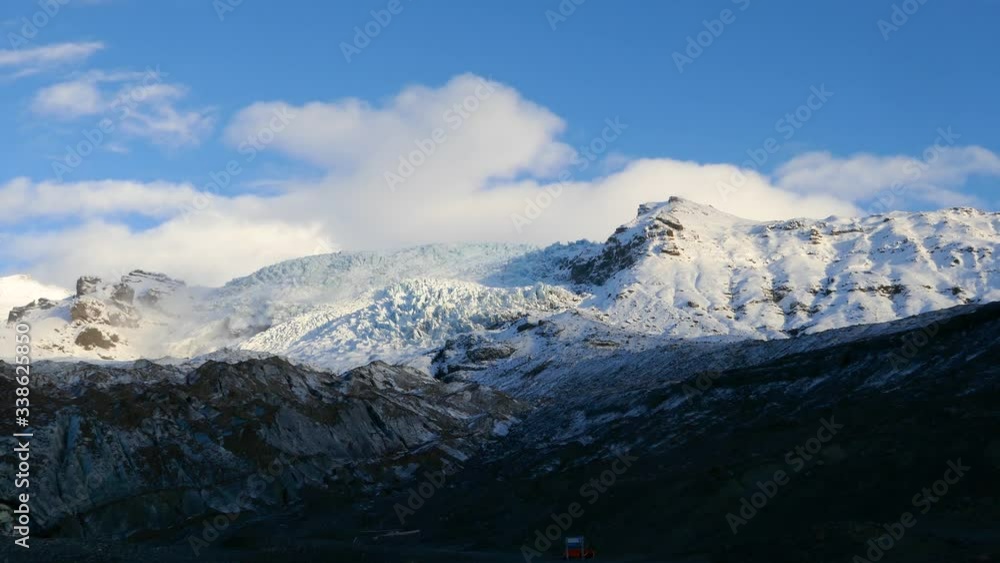 POV of a mountaineer looking at glacier with capped mountains POV of a mountaineer looking at glacier with capped mountains