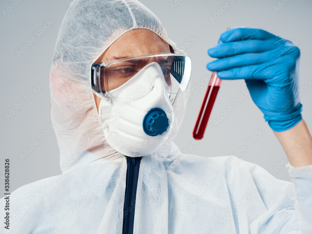 scientist in laboratory with test tubes scientist in laboratory with test tubes