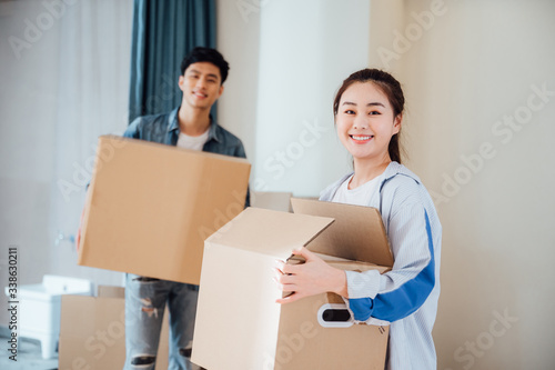 Asian young couples move to new house