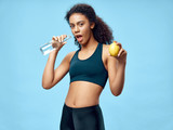 young sporty woman with water bottle