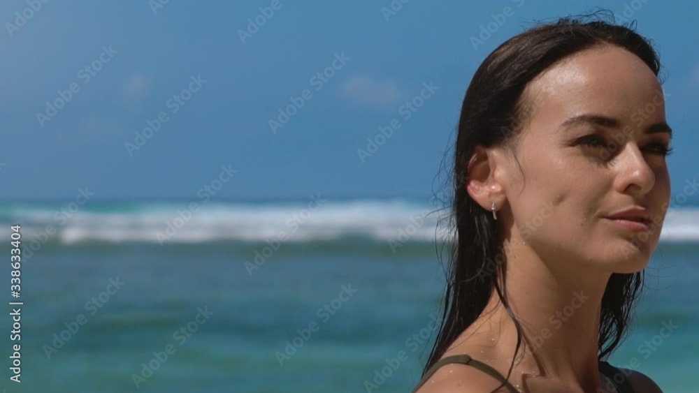 Ocean girl surf. Beautiful surfer woman running across the sea beach with surfboard to the blue water. Sun shining bright. Summer vacation on exotic island. Sport outdooor activity and travel concept. Ocean girl surf. Beautiful surfer woman running across the sea beach with surfboard to the blue water. Sun shining bright. Summer vacation on exotic island. Sport outdooor activity and travel concept.