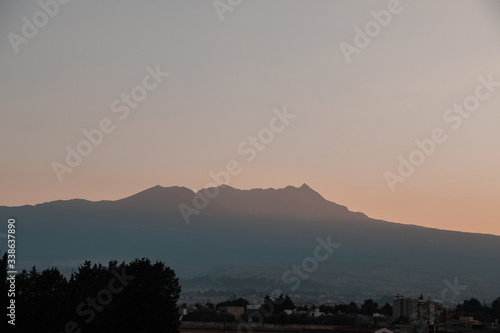 Nevado de toluca  in Mexico  volcano idle  with the last lights of the evening touching its summits.