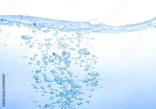 Clear water waves and air bubbles isolated over white background.