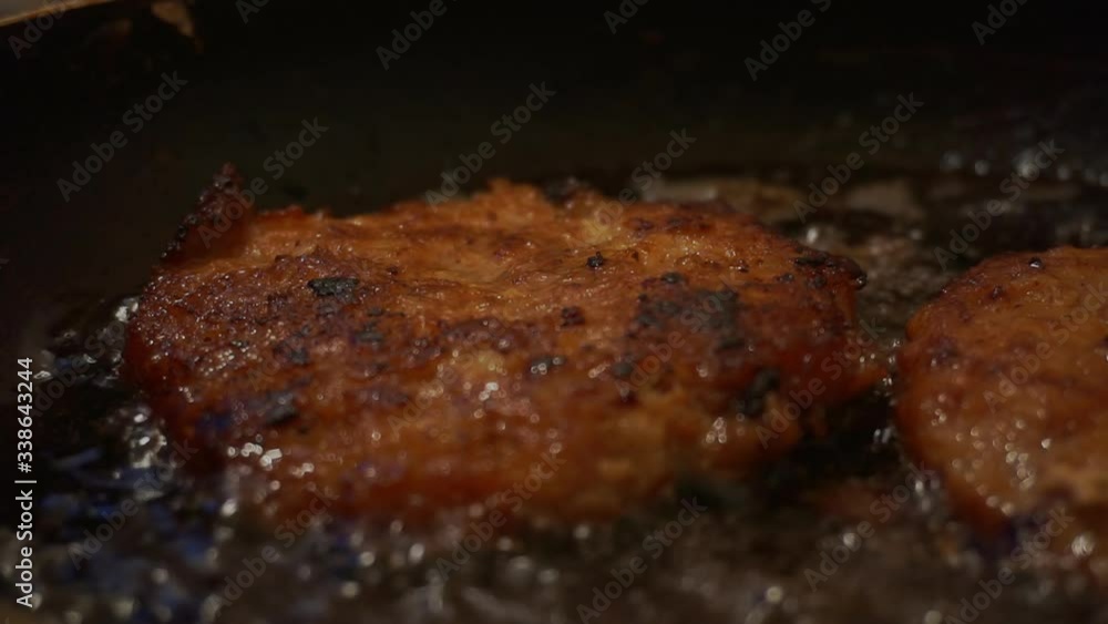 appetizing cutlets close up fried in a frying pan