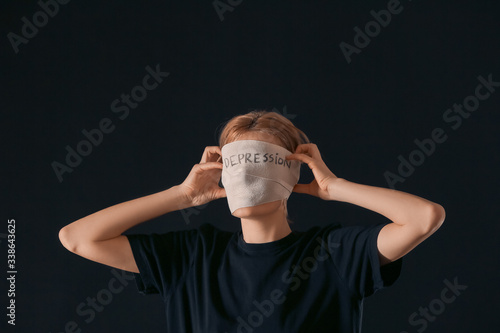 Woman with wrapped around h...