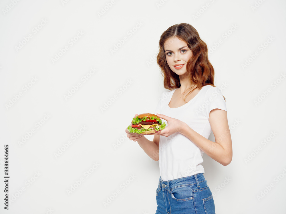 young woman holding salad