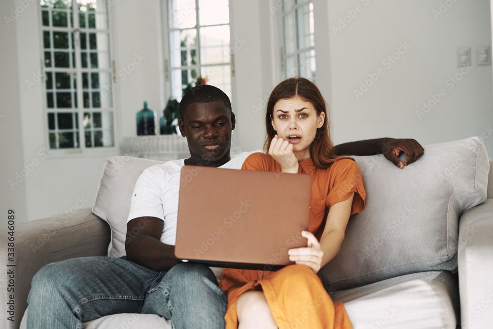 couple using laptop couple using laptop