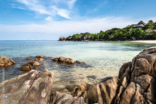 Amazing view of beautiful tropical sand beach with rock, clear water, Thailand, Phangan island, Secret beach.
